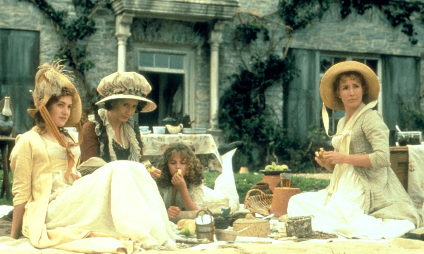 Four women outside having a picnic: they are the Dashwood women from Sense and Sensibility.