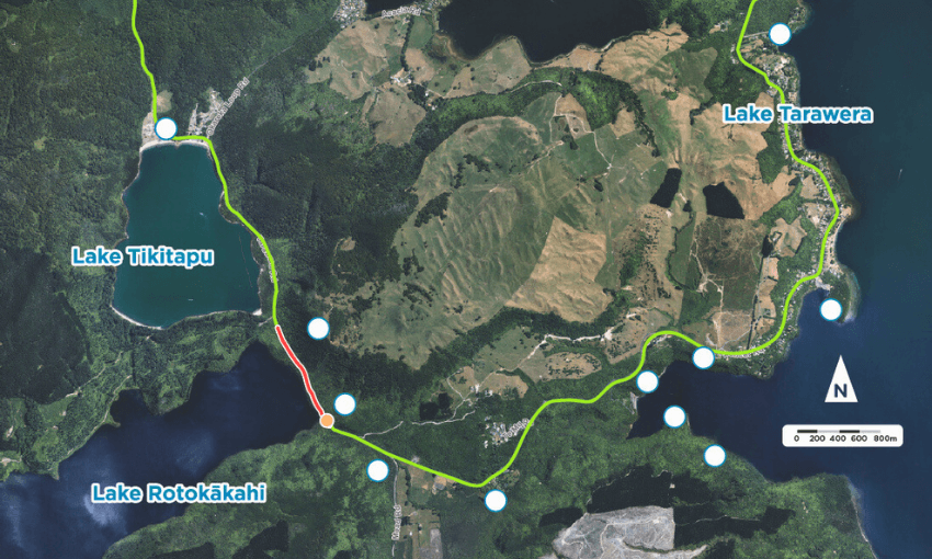 Aerial map showing three lakes: Lake Tikitapu, Lake Rotokākahi, and Lake Tarawera. A green route connects them, with a red section highlighting a particular area. North arrow and a scale bar are present. Forested areas and fields are visible.