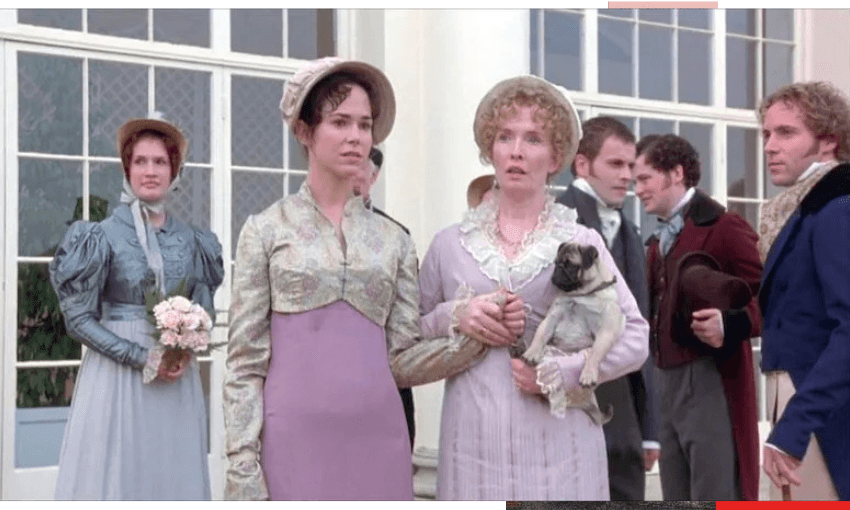 A scene from the film Mansfield Park with Frances O'Connor as Fanny Price in the centre of the image and Lindsay Duncan as Lady Bertram next to her, holding a pug dog. There are more cast members all in costume in the background. They are standing outside.