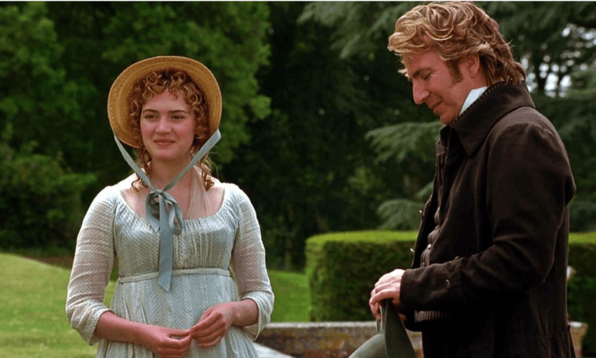 Alan Rickman as Colonel Brandon (RIP Alan Rickman) with Kate Winslet as Marianne Dashwood. They are standing outside in a park.