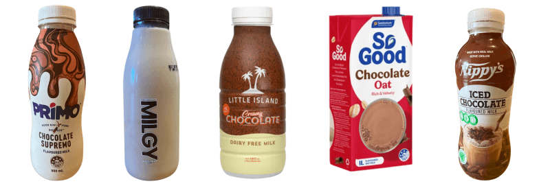 Five bottles of chocolate milk are lined up. From left to right: Primo Chocolate Supremo, Milky, Little Island Creamy Chocolate, So Good Chocolate Oat, and Nippy's Iced Chocolate. Each bottle has a distinct design and packaging.