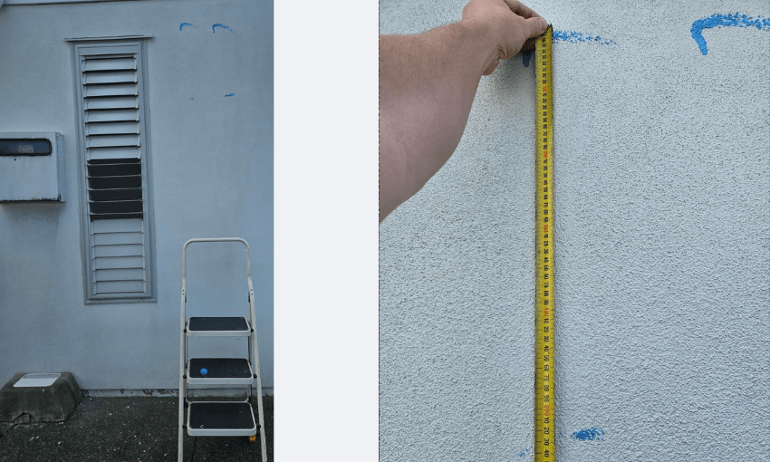 a white wall with a stepladder in front of it and a measurement showing more than 50cm
