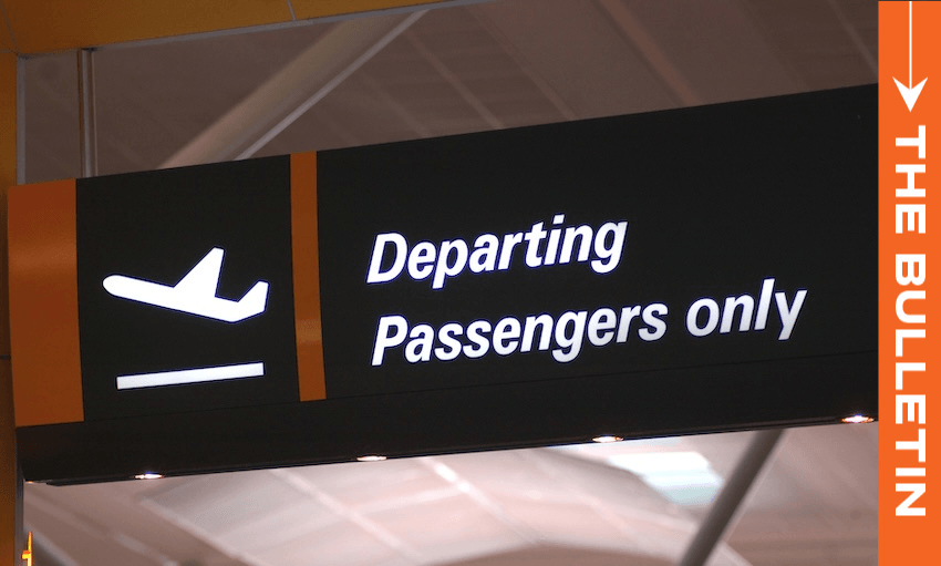 A black airport sign with a white airplane icon and the text "Departing Passengers only." An orange vertical strip on the right reads "THE BULLETIN." The ceiling structure is visible in the background.