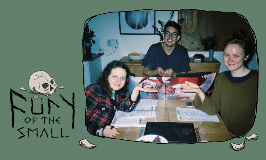 A green frame with "fury of the small" in text and a skull illustration overlays an image of two women and a man playing dungeons and dragons