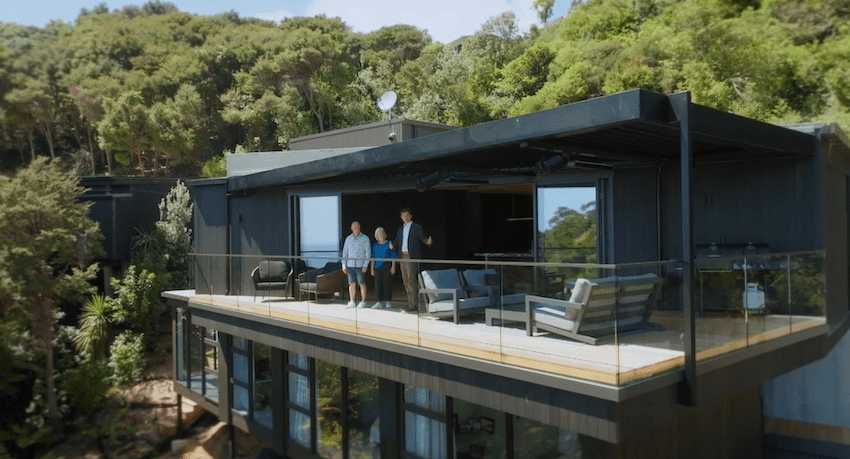 Grand Designs NZ host Tom Webster on Dale and Maria’s finished deck (Screengrab: TVNZ) 
