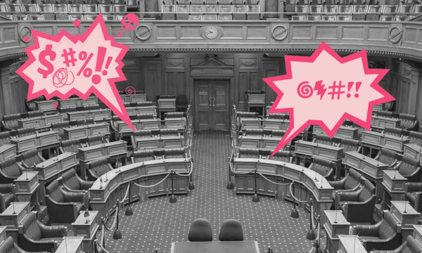 A black-and-white photo of an empty parliamentary chamber with two large, pink cartoon speech bubbles containing symbols representing shouting or swearing.