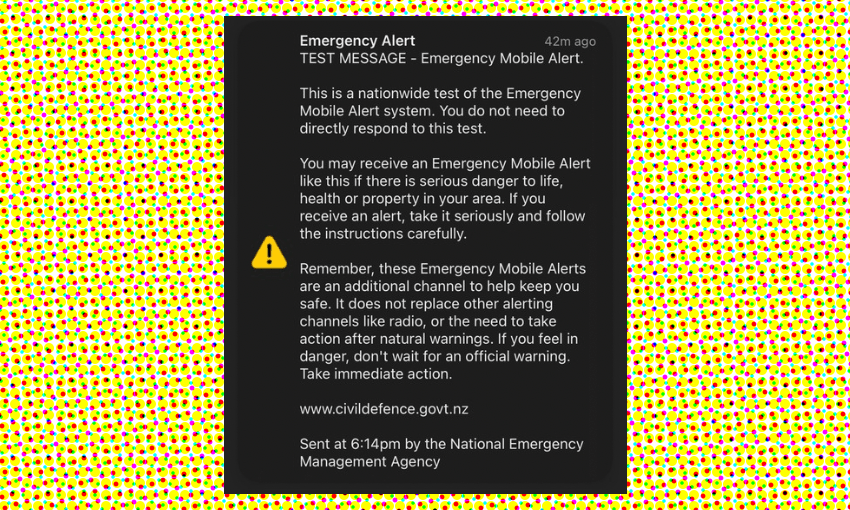 an emergency alert phone notification on a yellow spotty background
