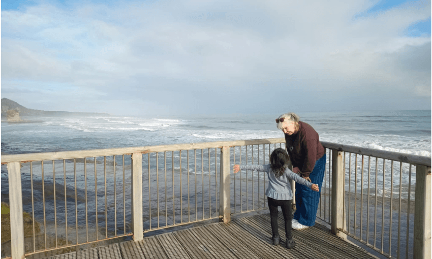 Mary McCallum and Becky Manawatu’s niece take in the beautiful setting of the Blackball Readers and Writers Festival. (Photo: Becky Manawatu) 
