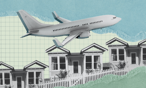 A grayscale aeroplane flies above a row of small houses with white fences, set against a graph paper background with blue and green torn paper textures.