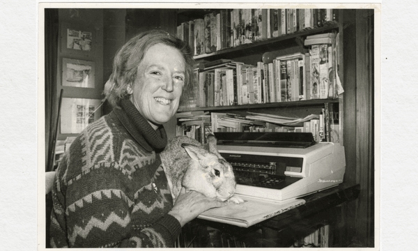  Margaret Mahy at her typewriter with her pet rabbit following her being awarded the Carnegie Medal by the British Library Association for the “The Haunting”. Photo: Christchurch Star Archive. Reproduced with permission from Star Media. 
