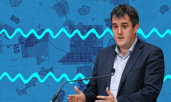 a blue background of a map with a serious looking image of Chris Bishop in the front