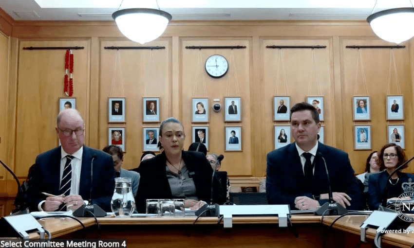 Oranga Tamariki chief executive Andrew Bridgman, Children's minister Karen Chhour and boot camp pilot lead Iain Chapman answer questions in Room 4.