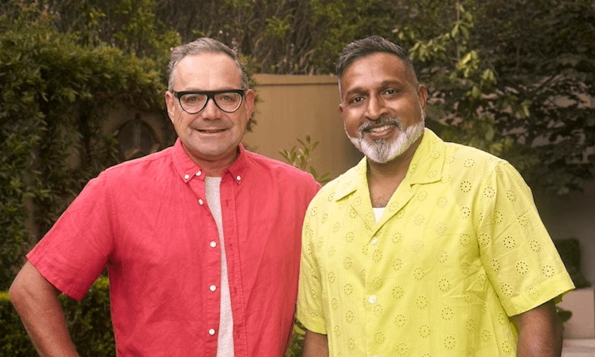 The two presenters of Eat Well For Less stand closely together and smile at the camera