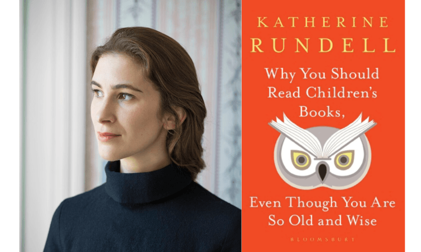 A photograph of the author Katherine Rundell who is a young woman with brown here, with her book 'Why you should read children's books even though you are so old and wise' beside her.