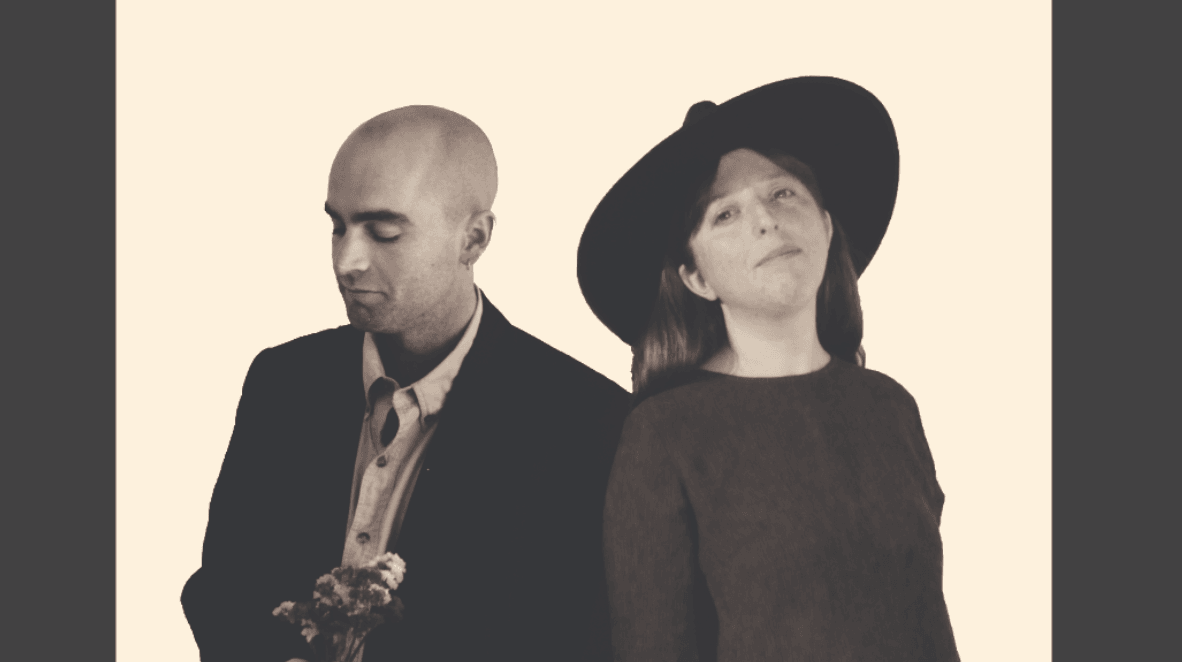 black and white photo of two indie musicians