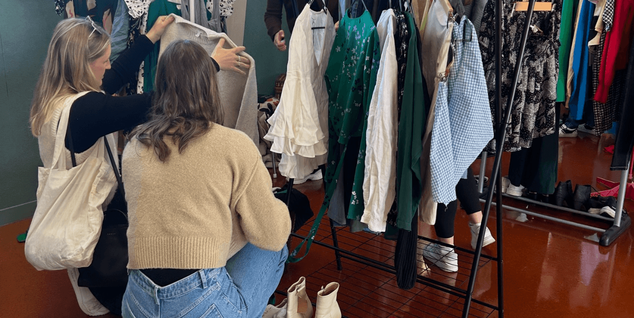 people shopping secondhand clothes