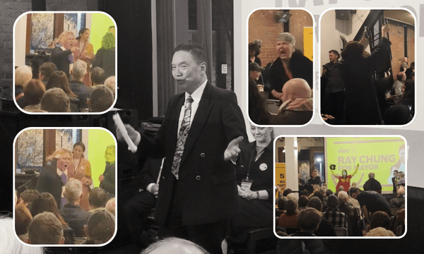 A man in a suit speaks to a seated audience in a hall. Four inset images show various people reacting with surprise, cheering, and speaking, while a projected screen behind reads “Ray Chung for Mayor.”.