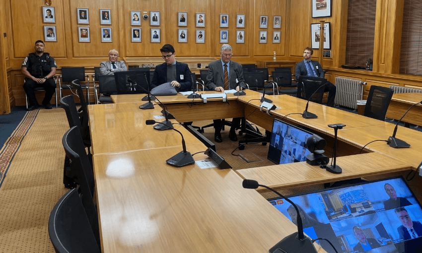 James Ross and Ray Deacon submit in person in select committee room 4, while Jordan Williams appears onscreen via Zoom.