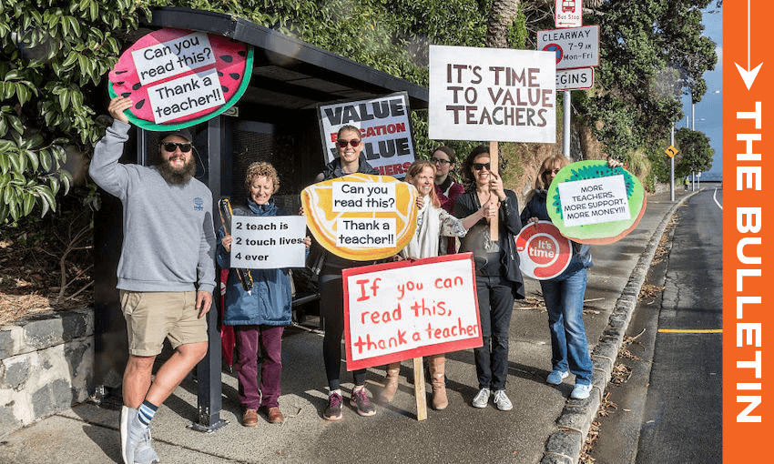 Striking teachers wait for a bus to take them to a rally, August 2018. (Photo by Dave Rowland/Getty Images) 
