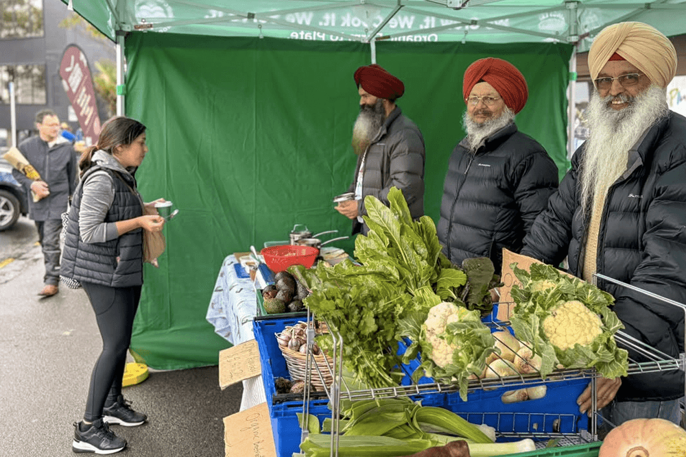 Vegetable sellers at Grey Lynn Farmers Market
