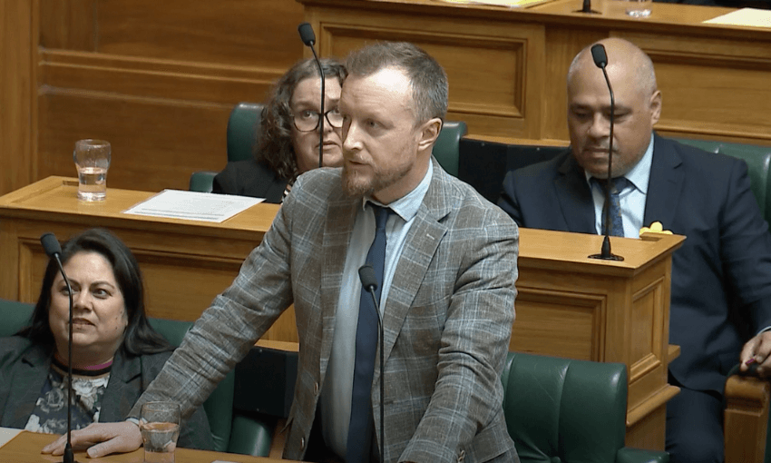 Kieran McAnulty addresses the Speaker of the House from his bench.