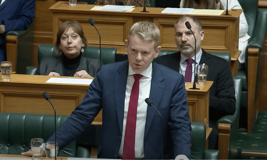 Chris Hipkins speaks to the House from his bench.