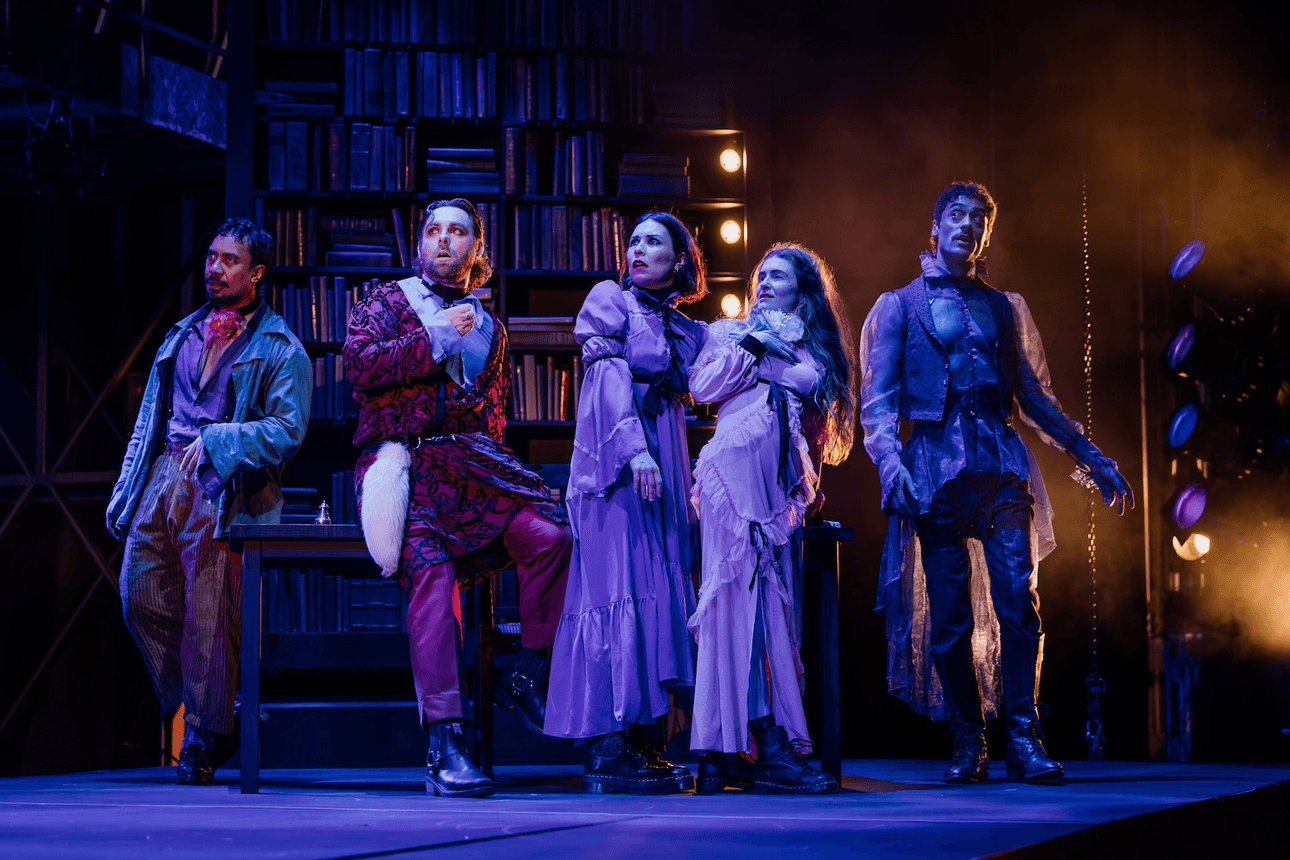 three men and two women in 19th century formalwear stand on a stage in a performance of Mary: The Birth of Frankenstein
