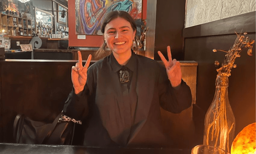 Chlöe Swarbrick throws up some peace signs. (Photo: Lyric Waiwiri-Smith)