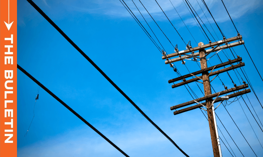 powerlines against a blue sky