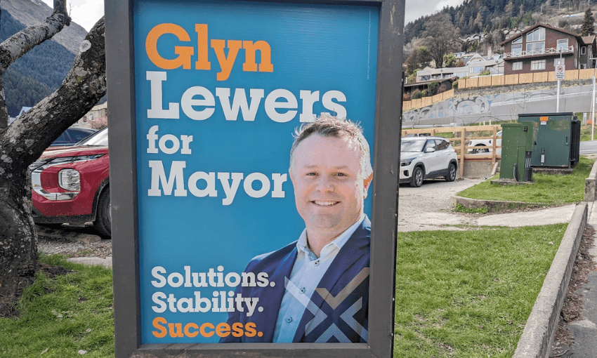 an election sign of a man in a suit smiling 'glyn lewers for mayor'