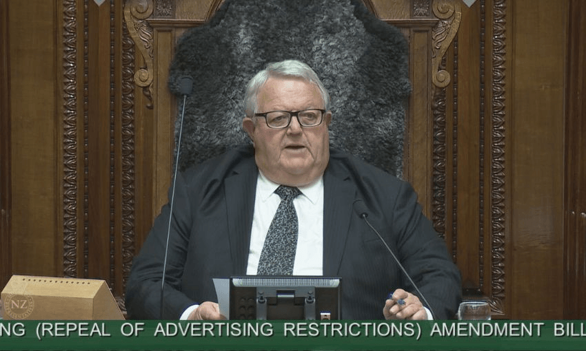 Speaker Gerry Brownlee sits behind his bench on the speaker's chair in the debating chamber.