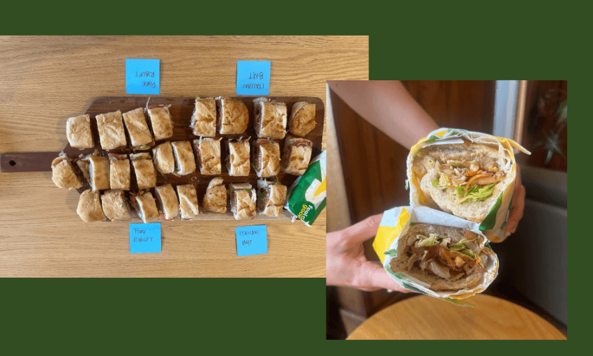A wooden board holds rows of cut sandwiches labeled “Tuna Melt,” “Italian BMT,” and “Steak & Cheese.” Next to it, hands hold a halved sandwich filled with lettuce, tomato, and other fillings.