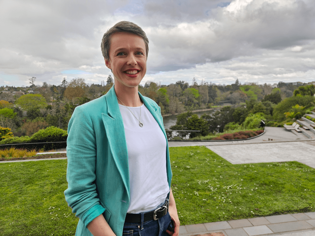 Sarah Thomson overlooking the Waikato River on the deck of Pickles Bar & Eatery in Hamilton