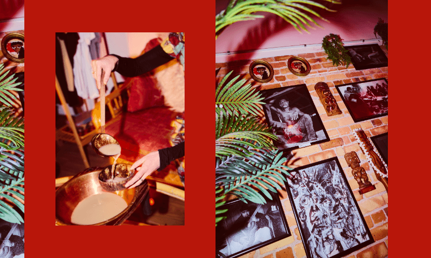 A person ladles liquid into a bowl; beside it, a brick wall displays black-and-white photos, small sculptures, and plants, with palm fronds in the foreground and a red filter over the image.