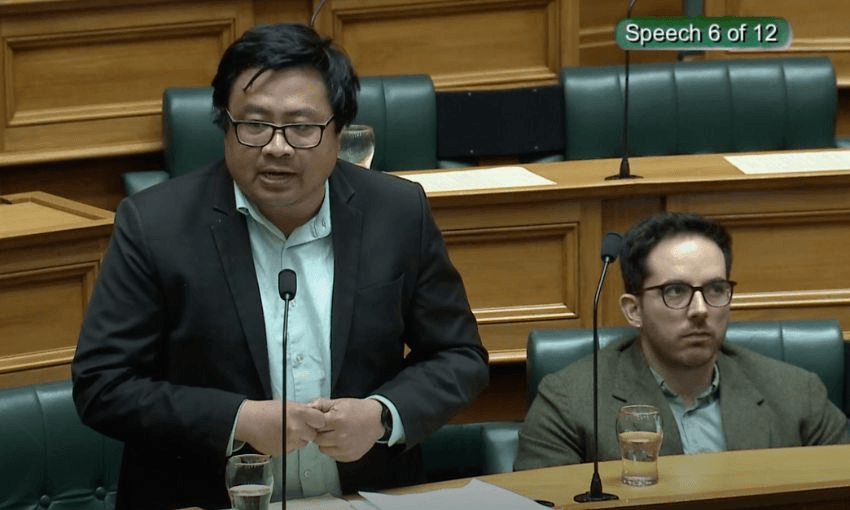 Francisco Hernandez, standing next to Riccardo Menendez March, speaks in the House.