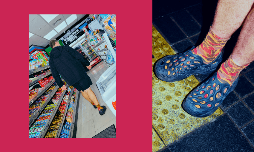 A person in a black jacket, shorts, and colorful socks with black hole-patterned clogs walks through a brightly lit convenience store aisle; a close-up shows their feet standing on a tactile paving surface.
