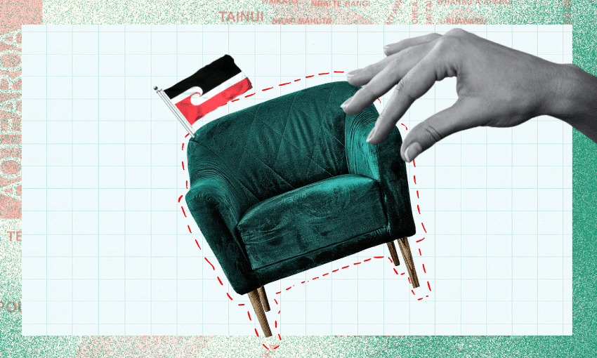 A green velvet armchair with a small black, red, and white flag on its backrest is shown. A large hand hovers above the chair, and the background features a light blue grid pattern with textured borders.