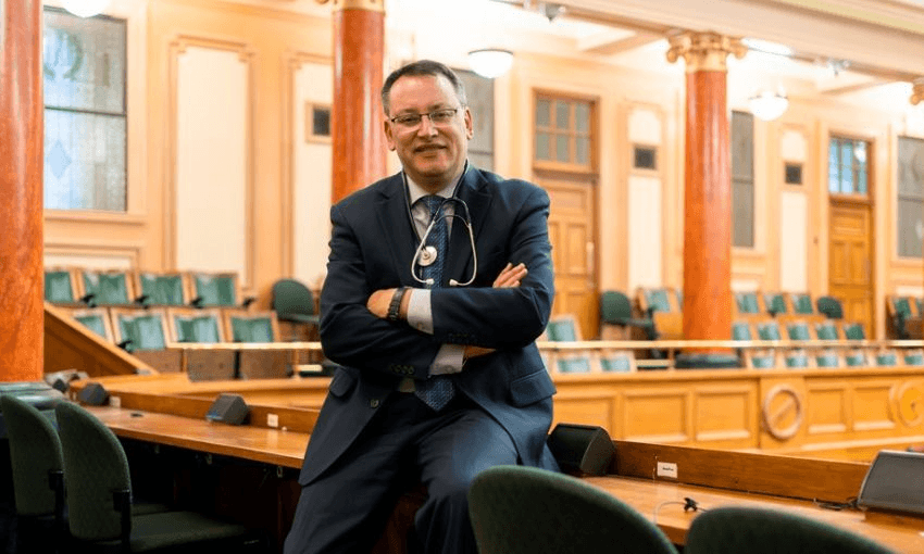 Shane Reti sits with his arms folded in parliament's public gallery.