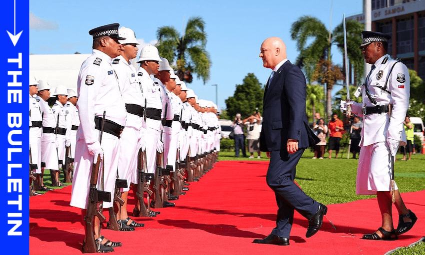 Prime minister Christopher Luxon inspects a guard of honour in Apia on March 16, 2026. (Photo: Ben STRANG / AFP via Getty Images) 
