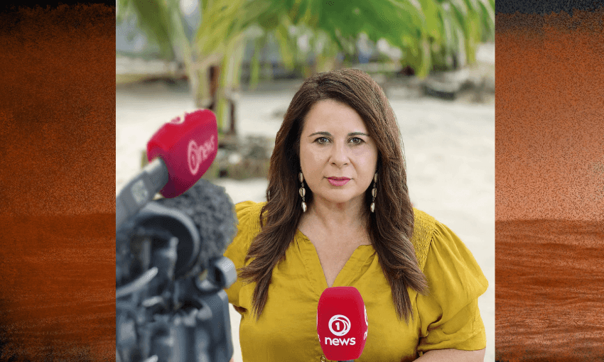 A photo of journalist Barbara Dreaver who is standing on a beach in front of a camera and holding a microphone.