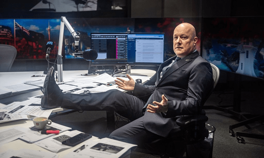 Christopher Luxon in happier times, relaxing in the Mike Hosking studio at Newstalk ZB. Photo by Michael Craig/New Zealand Herald via Getty Images 
