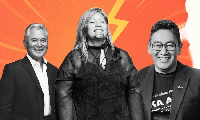 Three people stand in front of an orange background with a lightning bolt. The person in the center has long hair and traditional Māori chin moko. All three are smiling and appear confident.