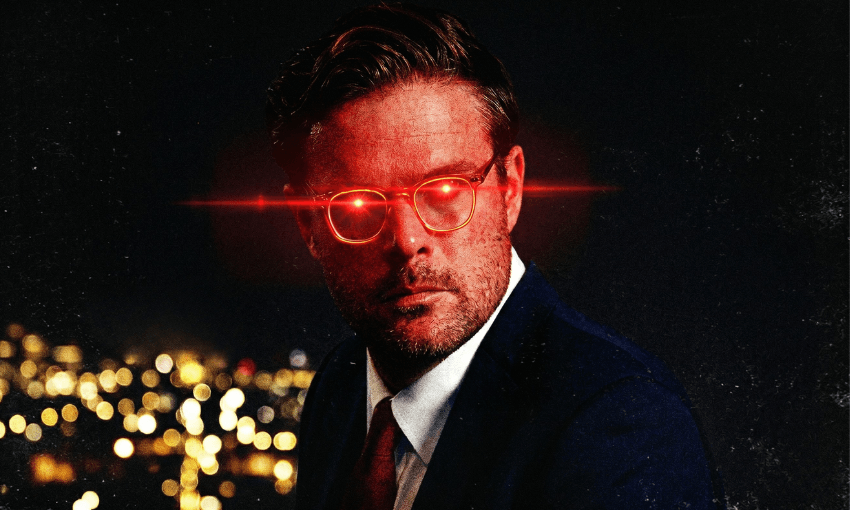 A man in a suit with neatly styled hair is shown at night with a cityscape of blurred lights behind him. His glasses emit bright red laser beams from the lenses, giving a dramatic glowing effect.