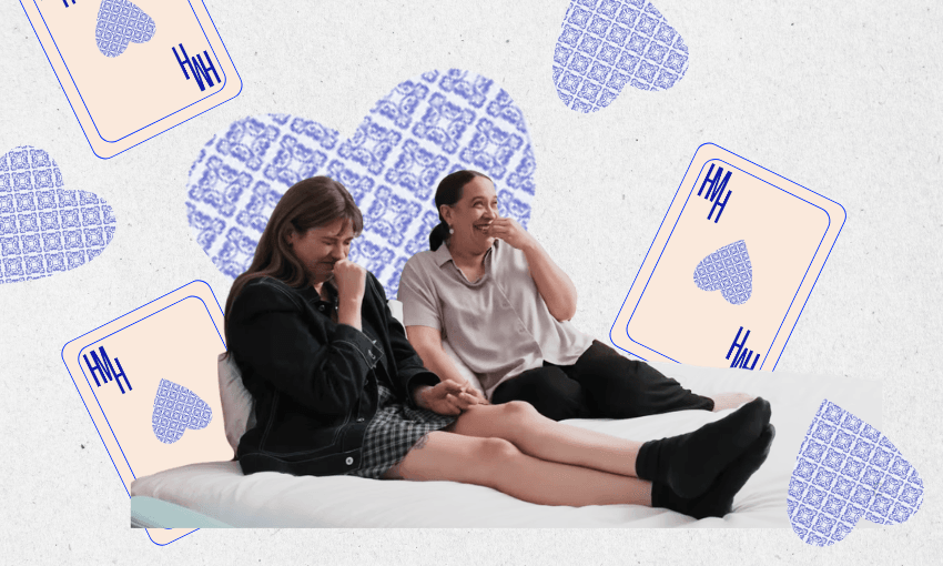 Two women sit on a bed laughing together, surrounded by illustrated playing cards and heart shapes on a light background.