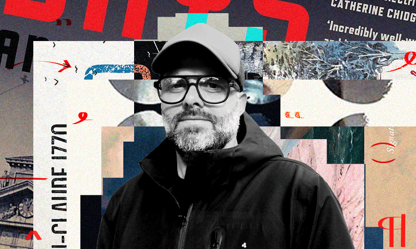 A black and white photo of Anthony Byrt who is a man, middle aged wearing a cap and glasses. Behind him is a collage of book covers.