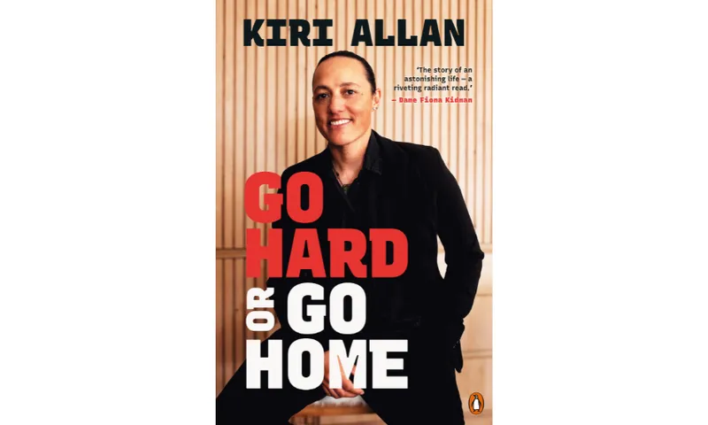 The cover of Kiri Allan's memoir called Go Hard or Go Home which shows the author in a black suit looking relaxed and smiling.