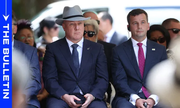 Christopher Luxon in a hat sitting to the left of David Seymour
