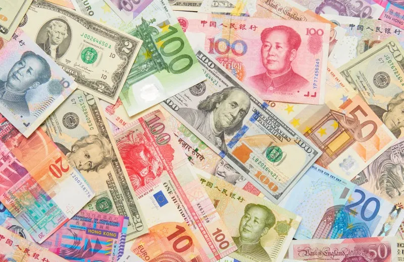 A pile of international currencies.
