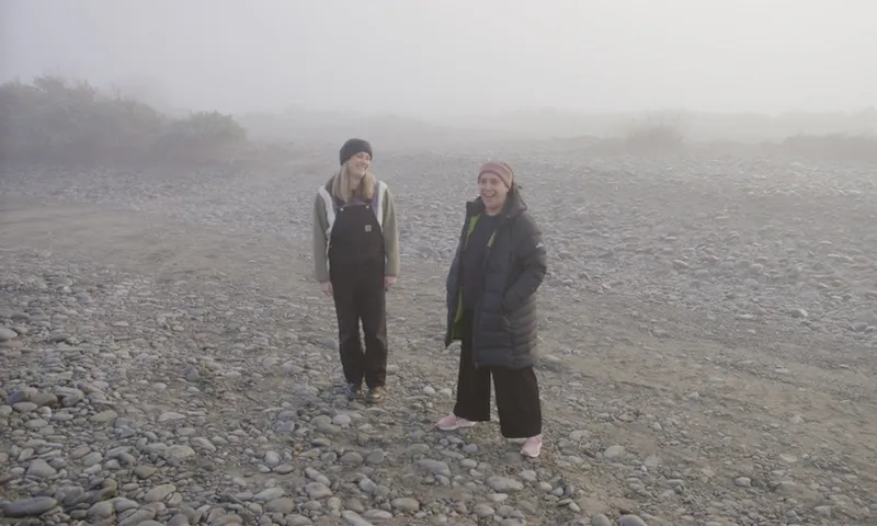 brynley stent and kura forrester in the middle of a frosty field shrouded in fog