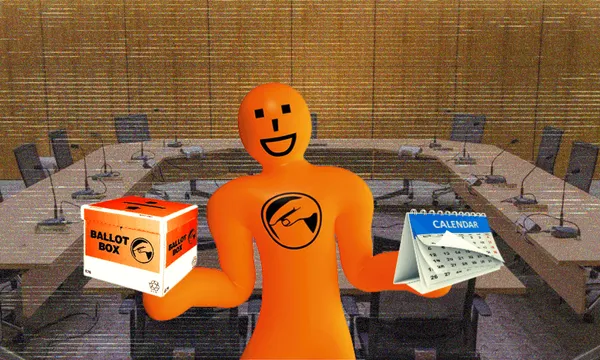 An orange, smiling figure holds a ballot box in its left hand and a calendar in its right hand. The scene is set in a large conference room with empty chairs and microphones on a table.